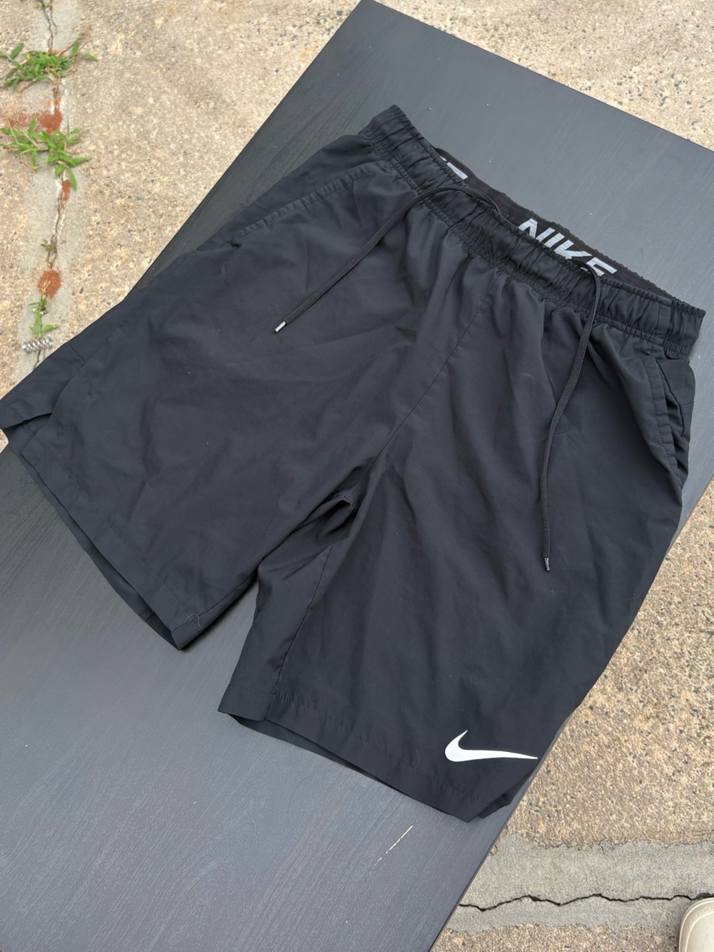 Nike Black Athletic Shorts with White Swoosh